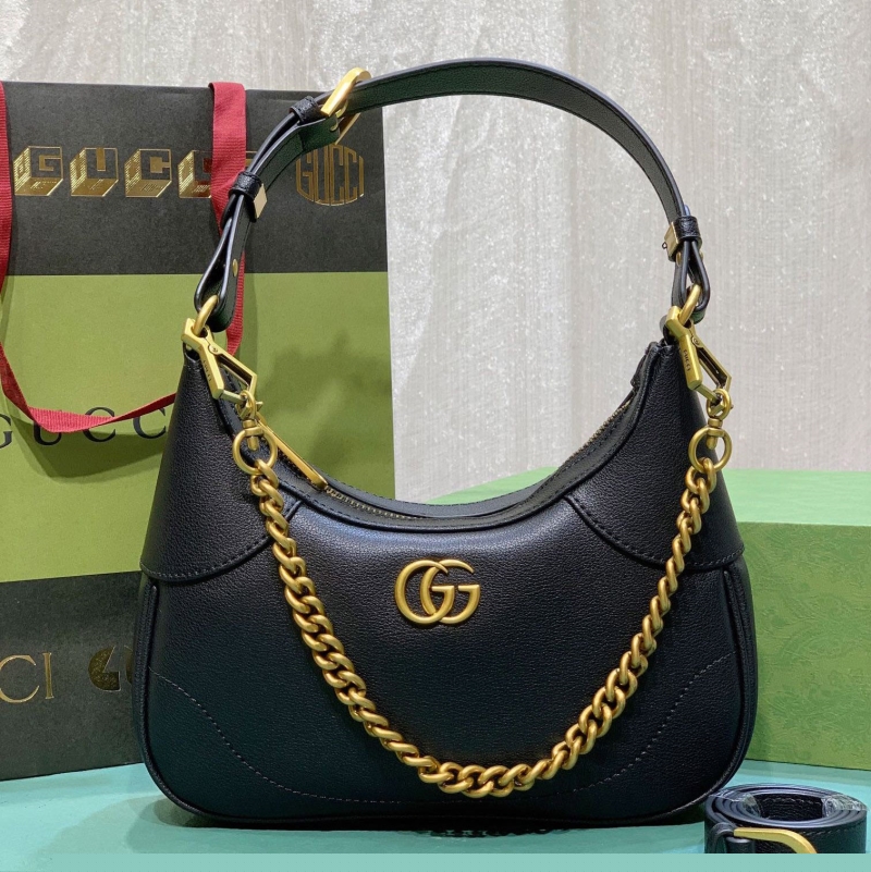G*u*i top handle bags